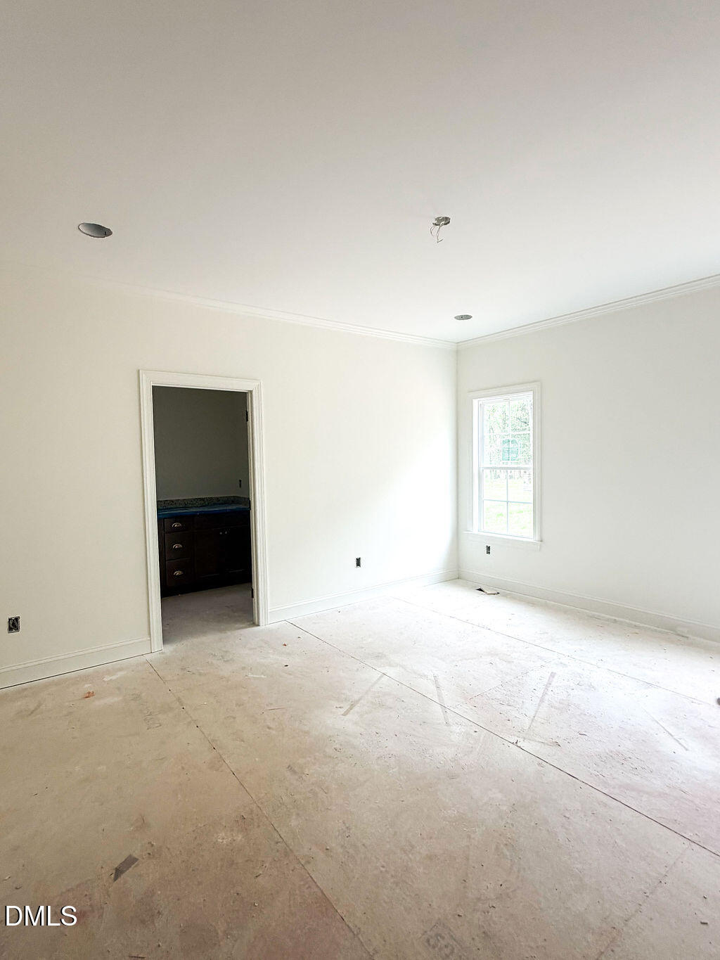 9574 Stallings Road Spring Hope, NC 27882 - Photo 23 of 31 a view of an empty room with closet and window