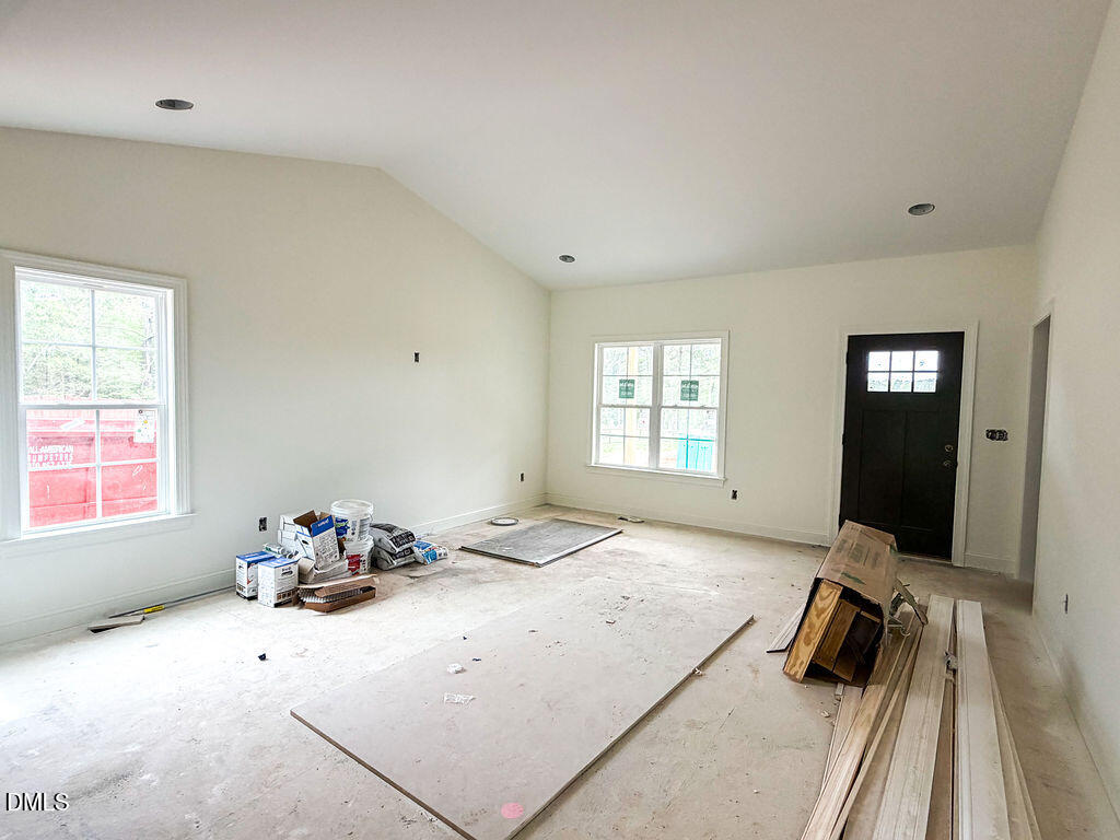 9574 Stallings Road Spring Hope, NC 27882 - Photo 6 of 31 a bedroom with a bed and a window