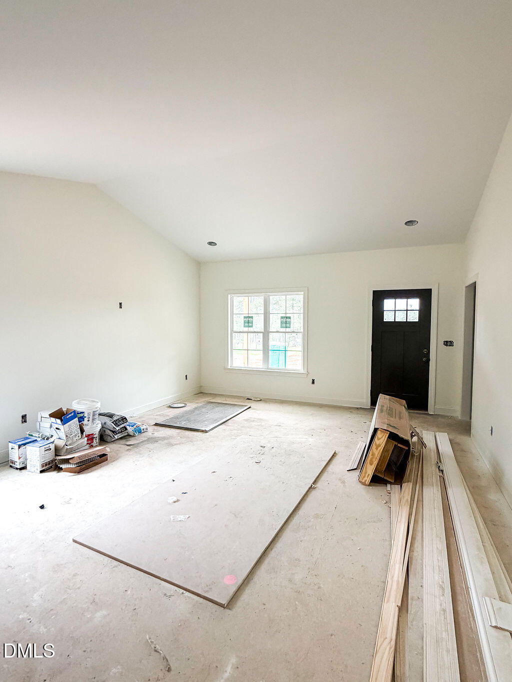 9574 Stallings Road Spring Hope, NC 27882 - Photo 8 of 31 a bedroom with a bed and a large window