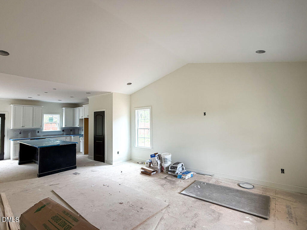 9574 Stallings Road Spring Hope, NC 27882 - Photo 9 of 31 a view of a livingroom with furniture and window