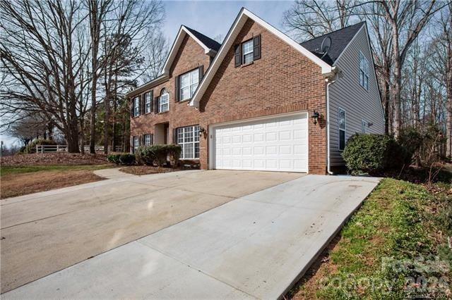 815 Knightsbridge Road Fort Mill, SC 29708 - Photo 2 of 30 a front view of a house with a yard