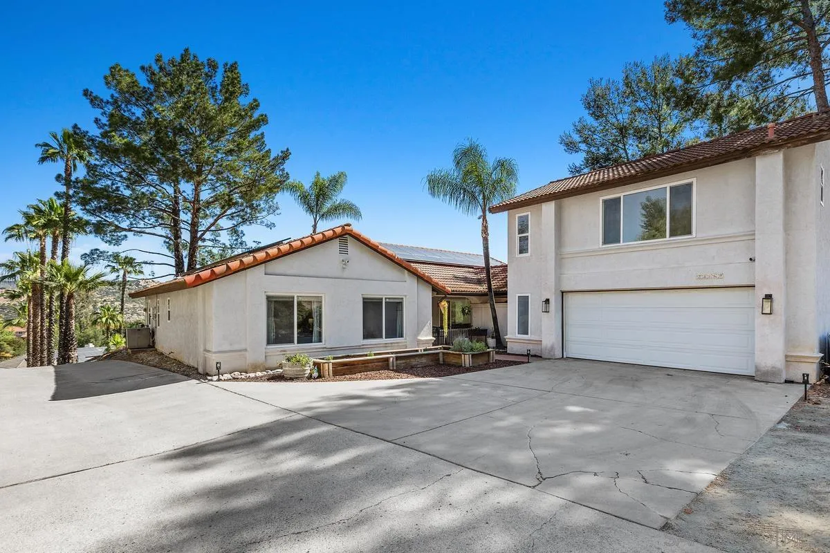 23969 Nectar Way Ramona, CA 92065 - Photo 1 of 54 a view of a house with a yard and potted plants