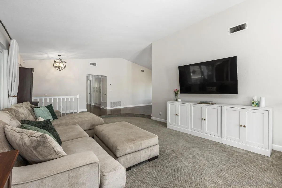 23969 Nectar Way Ramona, CA 92065 - Photo 12 of 54 a living room with furniture and a flat screen tv