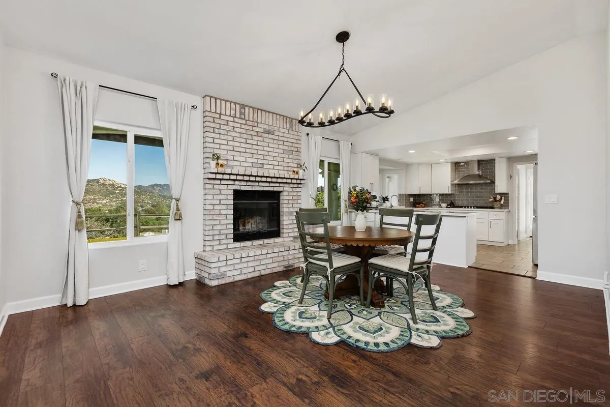 23969 Nectar Way Ramona, CA 92065 - Photo 15 of 54 a living room with furniture and a fireplace
