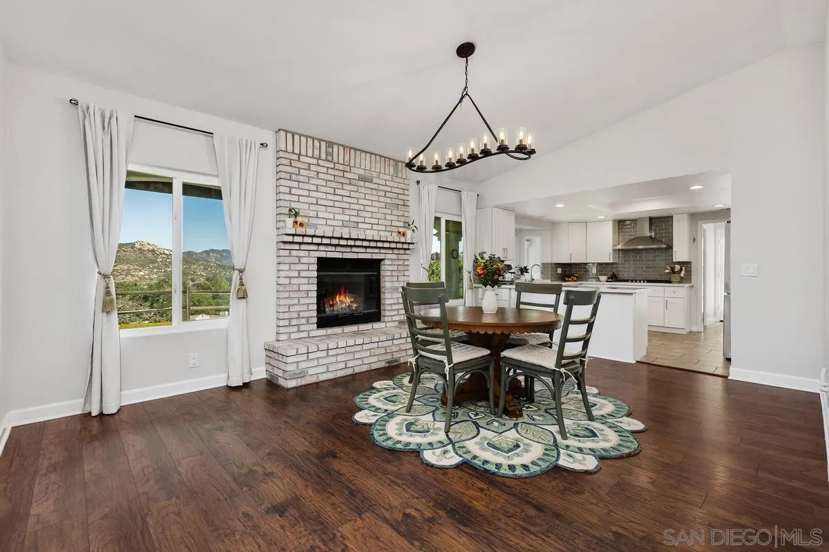 23969 Nectar Way Ramona, CA 92065 - Photo 16 of 54 a living room with furniture and a fireplace