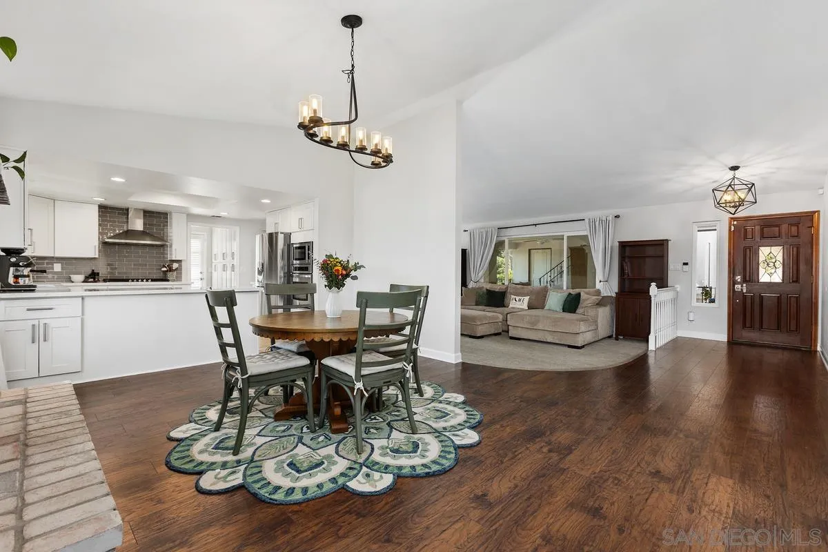 23969 Nectar Way Ramona, CA 92065 - Photo 17 of 54 a view of a dining room with furniture and wooden floor