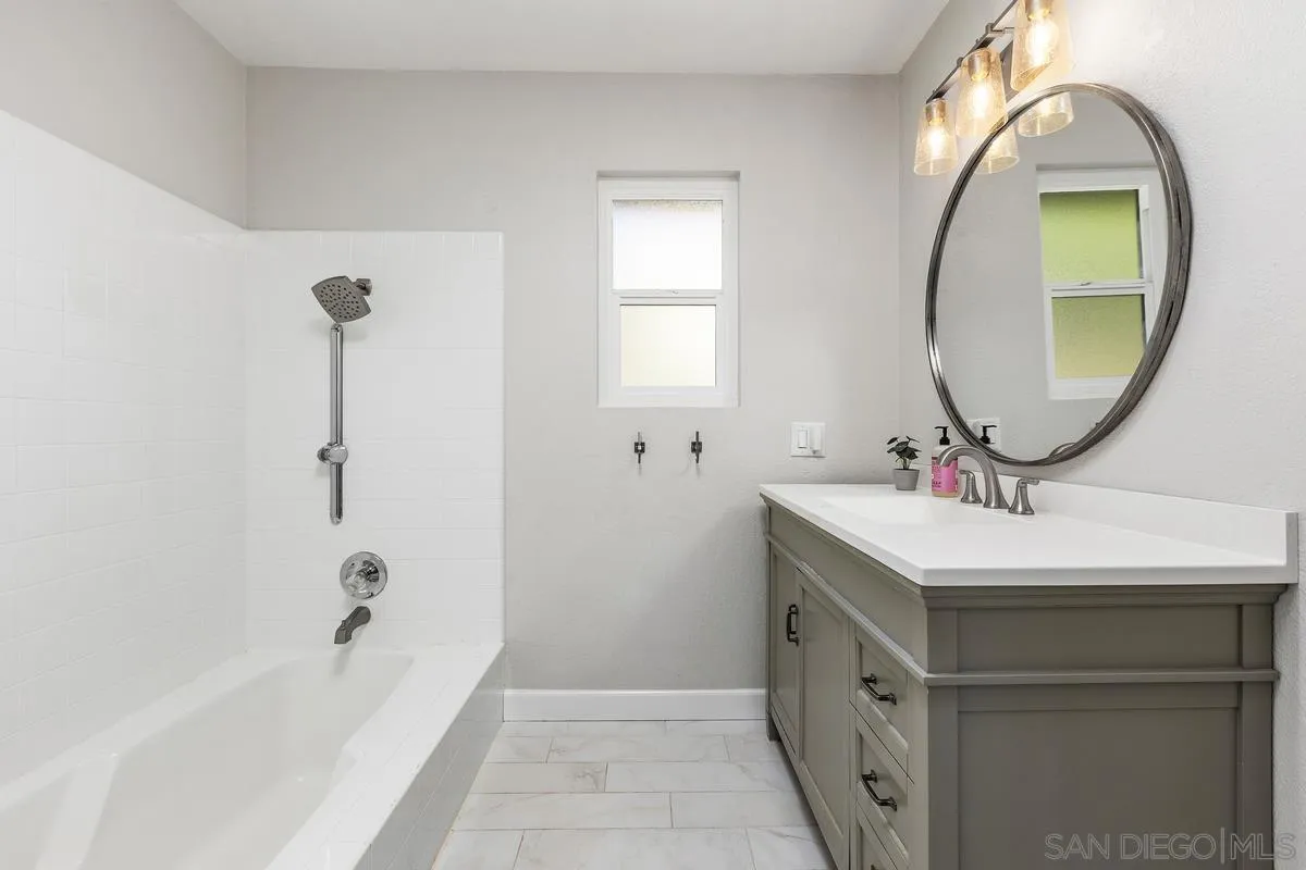 23969 Nectar Way Ramona, CA 92065 - Photo 26 of 54 a bathroom with a sink and a mirror