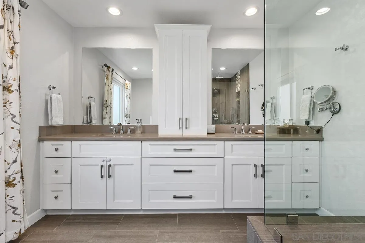 23969 Nectar Way Ramona, CA 92065 - Photo 29 of 54 a bathroom with a sink vanity and mirror