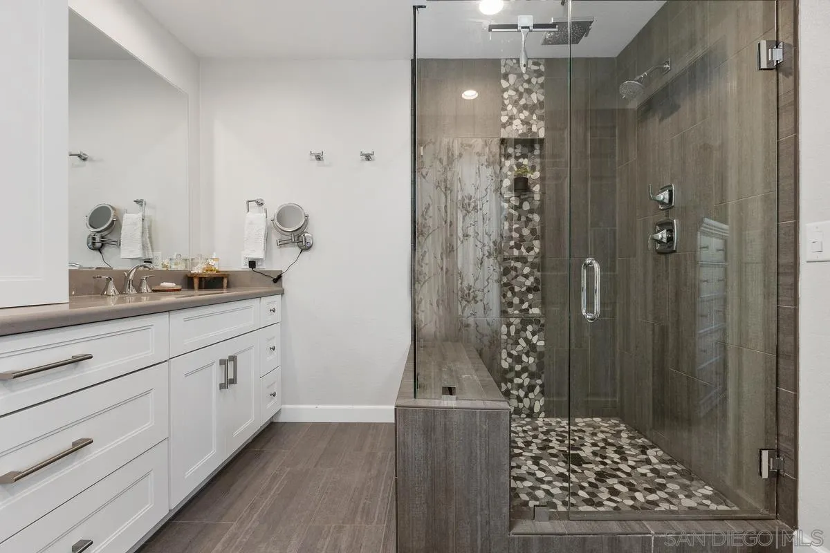 23969 Nectar Way Ramona, CA 92065 - Photo 30 of 54 a bathroom with a shower and a sink
