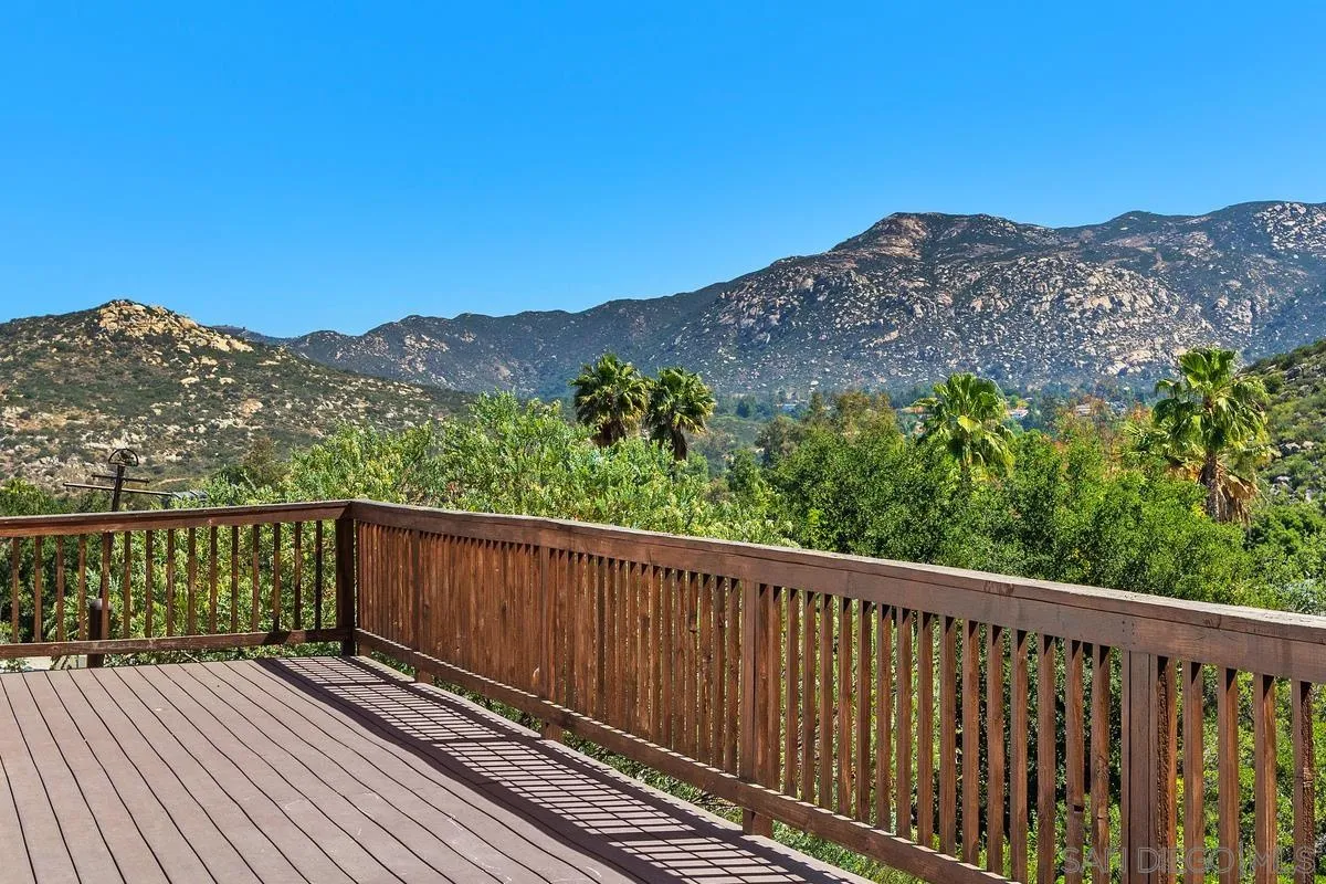 23969 Nectar Way Ramona, CA 92065 - Photo 35 of 54 a view of a balcony with wooden fence