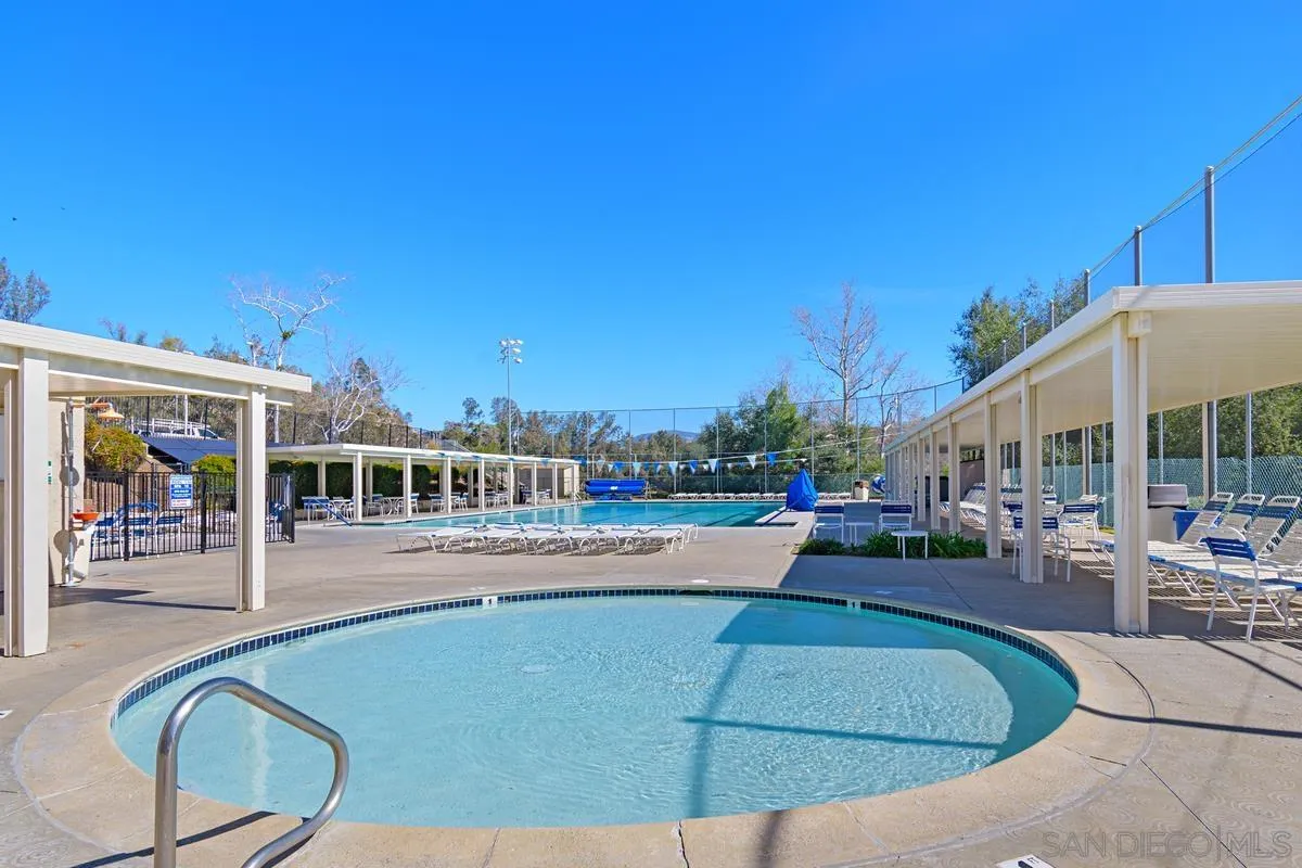 23969 Nectar Way Ramona, CA 92065 - Photo 47 of 54 a house view with a swimming pool and sitting space