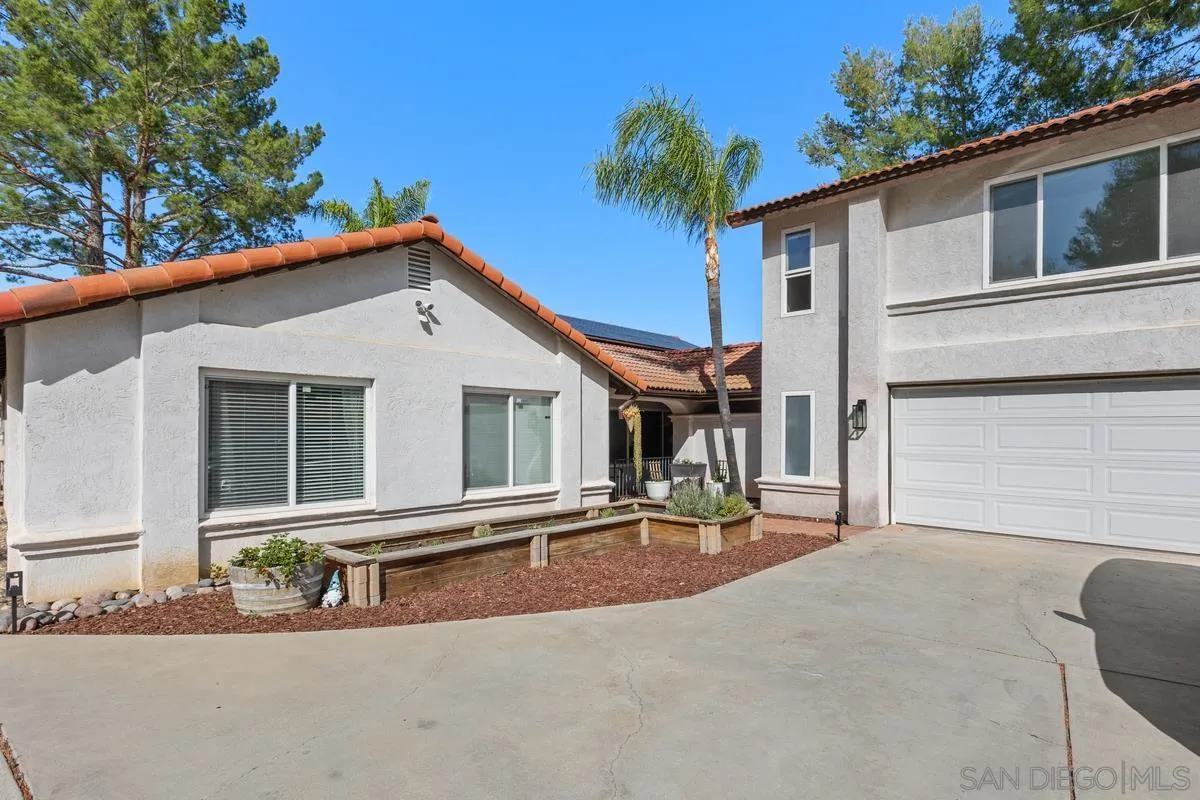 23969 Nectar Way Ramona, CA 92065 - Photo 6 of 54 a backyard of a house with table and chairs