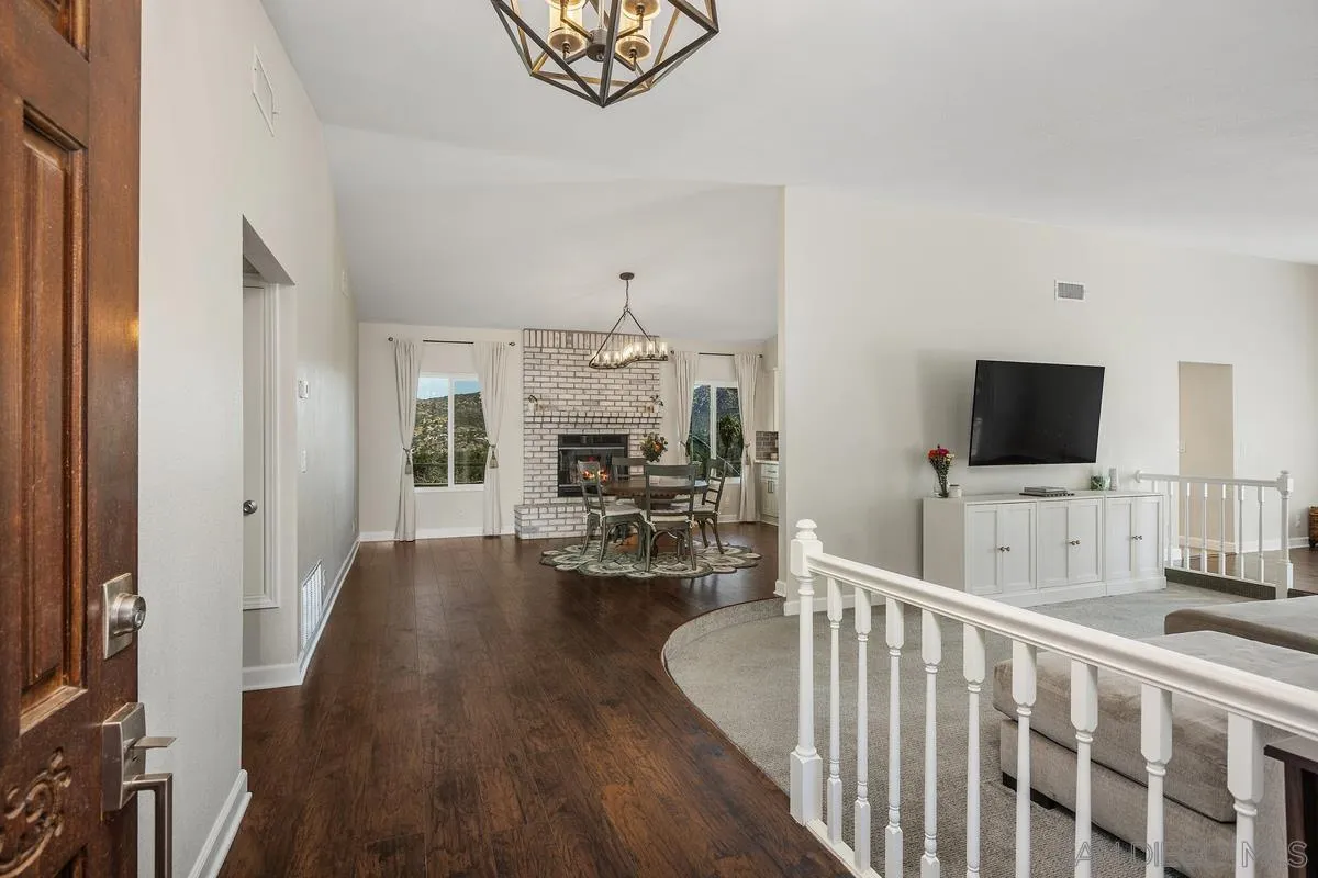 23969 Nectar Way Ramona, CA 92065 - Photo 10 of 54 a living room with furniture and a flat screen tv