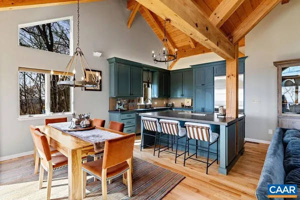 a kitchen with stainless steel appliances granite countertop a stove and a sink