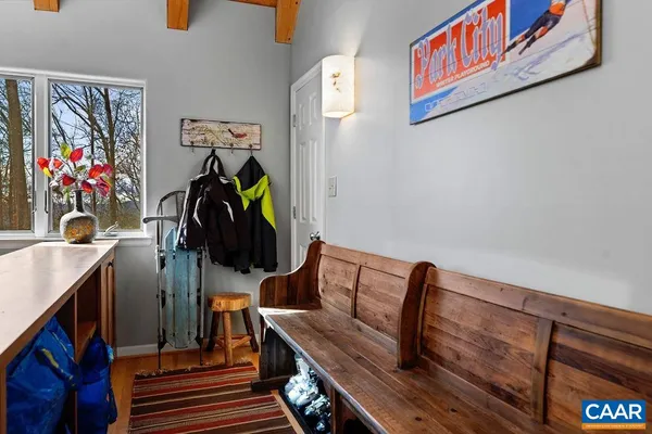 a living room with furniture fireplace and flat screen tv