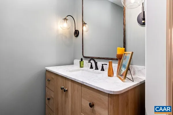 a living room with furniture fireplace and flat screen tv