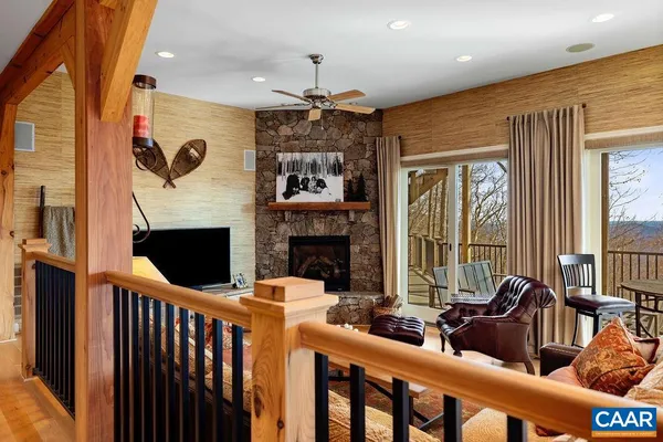 a view of a dining room with furniture and window