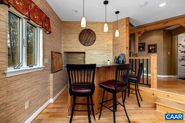 a kitchen with stainless steel appliances white cabinets and a sink