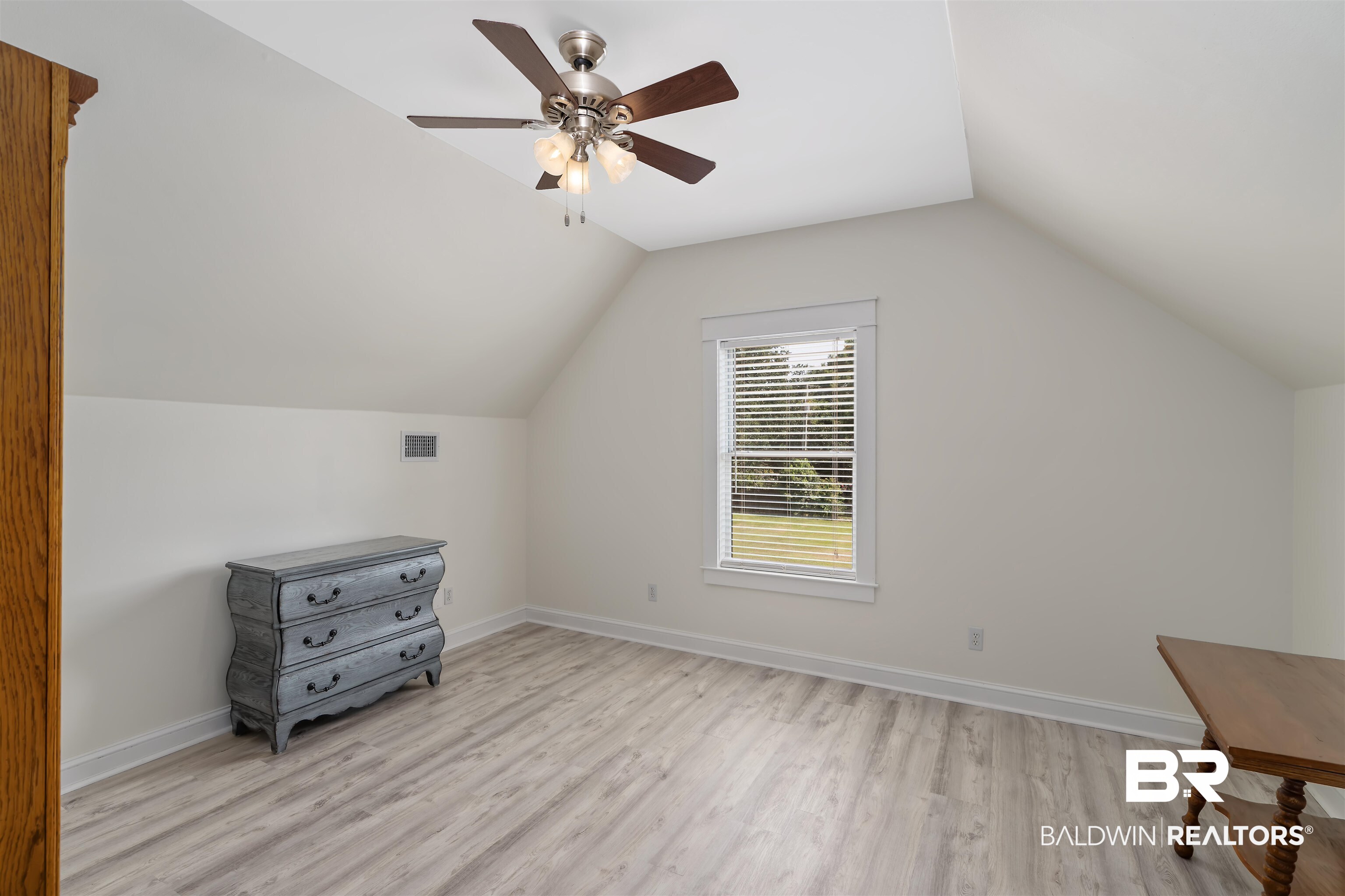 16330 Danne Road Fairhope, AL 36532 - Photo 22 of 43 Bonus room with ceiling fan, light hardwood / wood-style flooring, and lofted ceiling