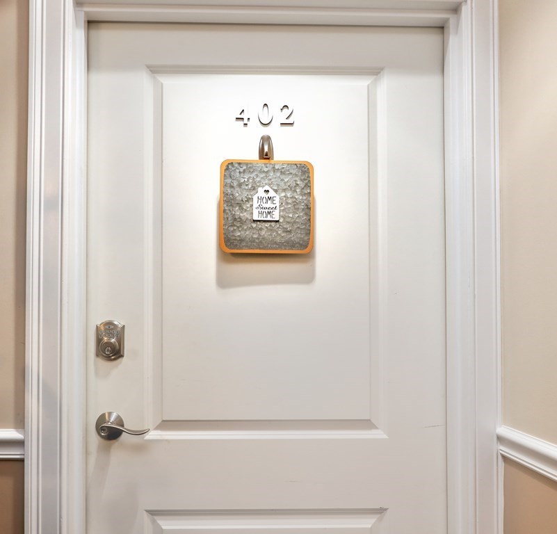 426 Main Street, Unit 402 Melrose, MA 02176 - Photo 2 of 24 a view of a hallway