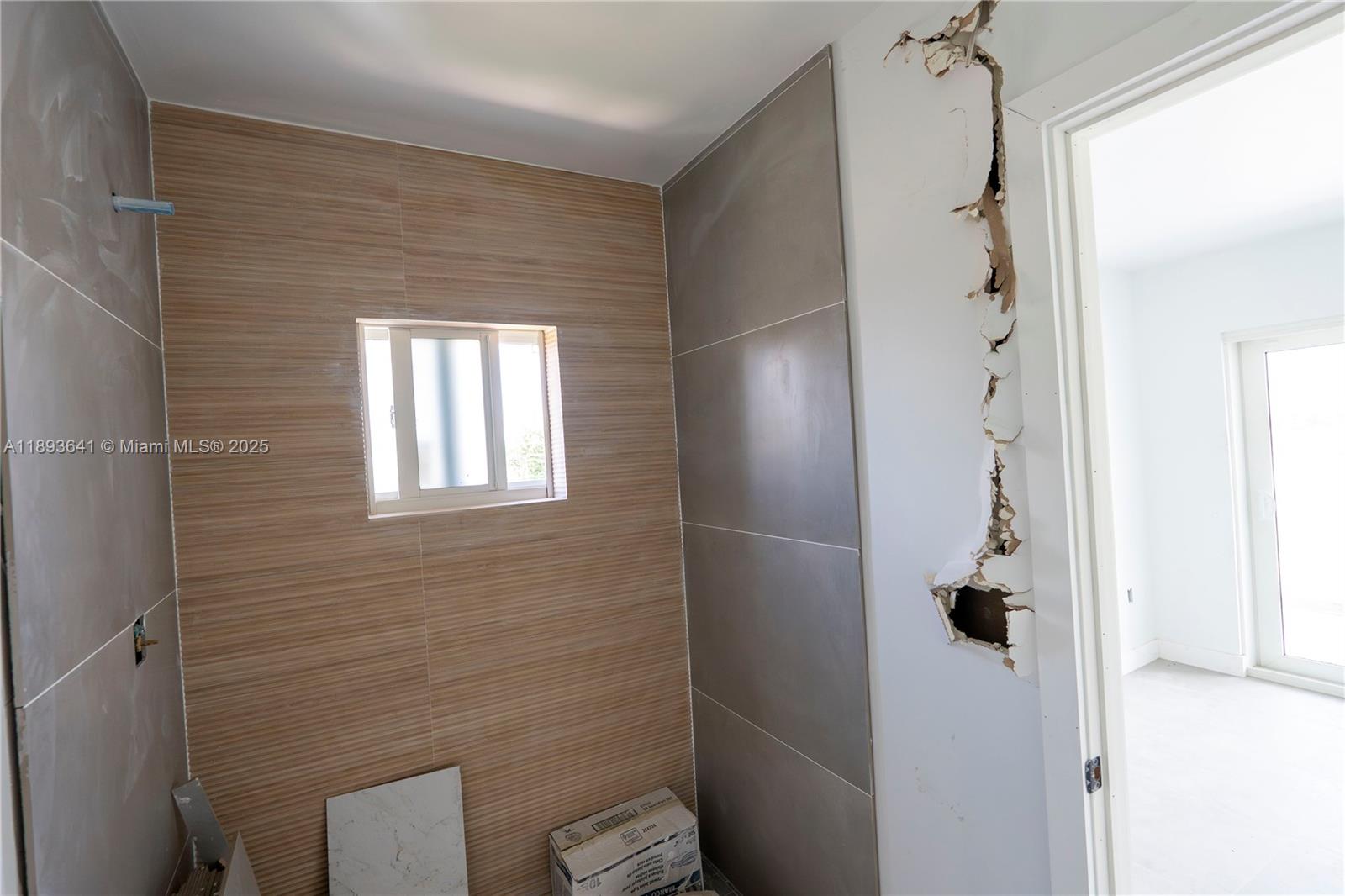 10290 Southwest 174th Terrace Miami, FL 33157 - Photo 11 of 15 a bathroom with a shower