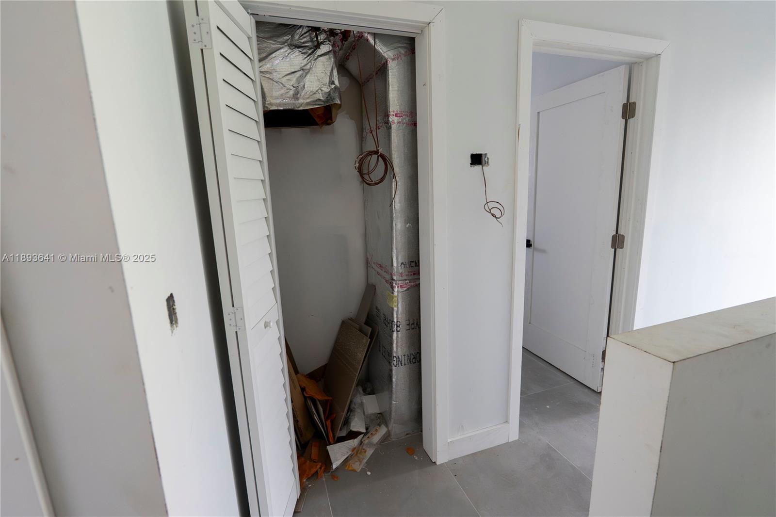 10290 Southwest 174th Terrace Miami, FL 33157 - Photo 13 of 15 a view of walk in closet