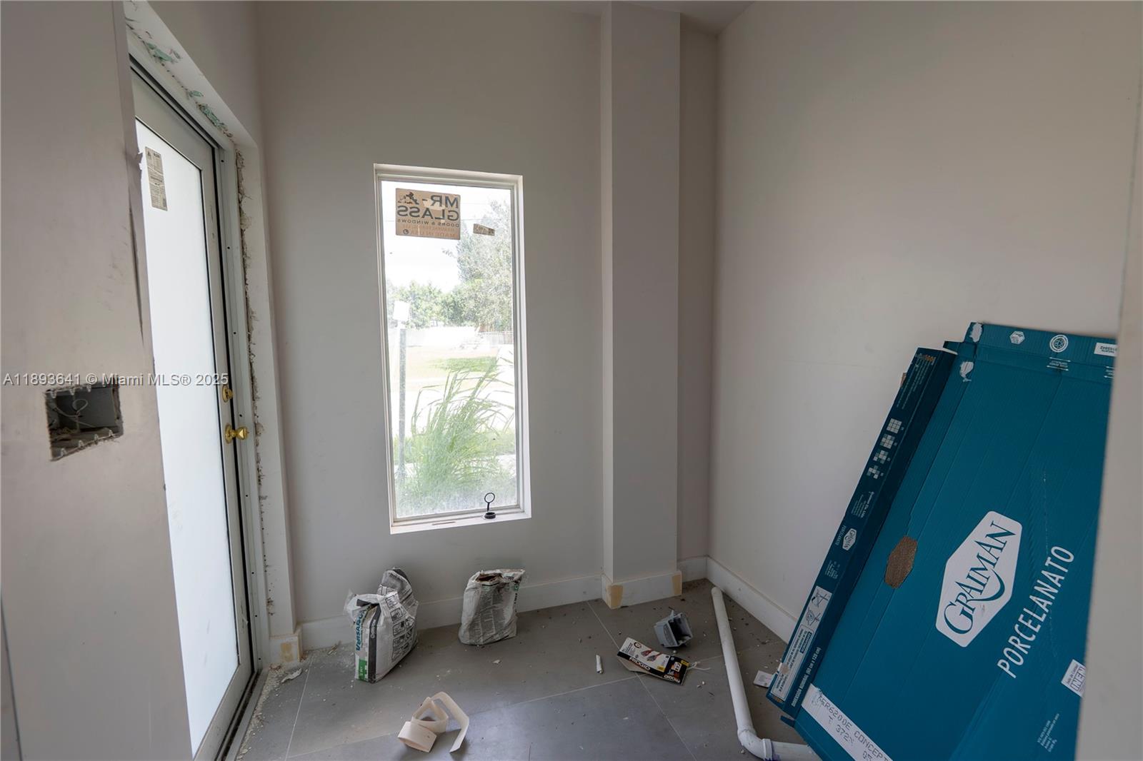 10290 Southwest 174th Terrace Miami, FL 33157 - Photo 10 of 15 a room with a window and a mirror