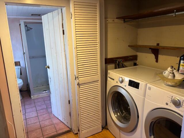 19 Monument Road Orleans, MA 02653 - Photo 11 of 20 a view of storage and utility room with washer and dryer