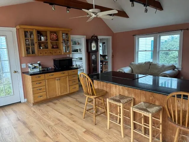 a kitchen with stainless steel appliances granite countertop a stove and a sink