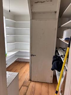 19 Monument Road Orleans, MA 02653 - Photo 5 of 20 a view of walk in closet with clothes and shoes