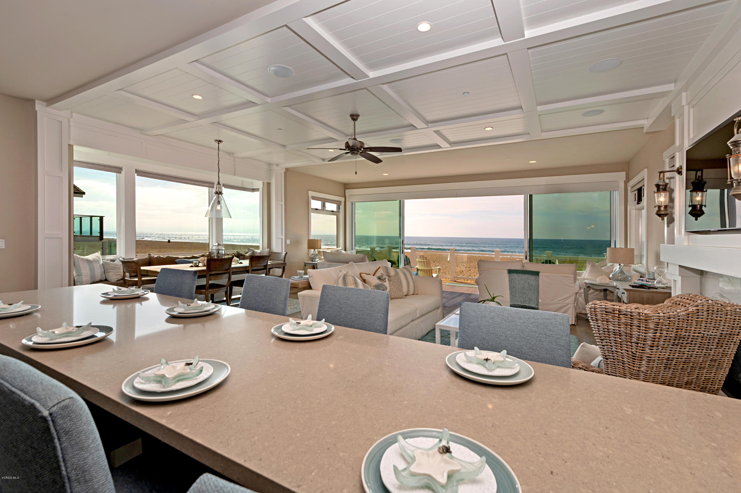 935 Mandalay Beach Road Oxnard, CA 93035 - Photo 16 of 67 a view of a dining room with furniture large window and wooden floor