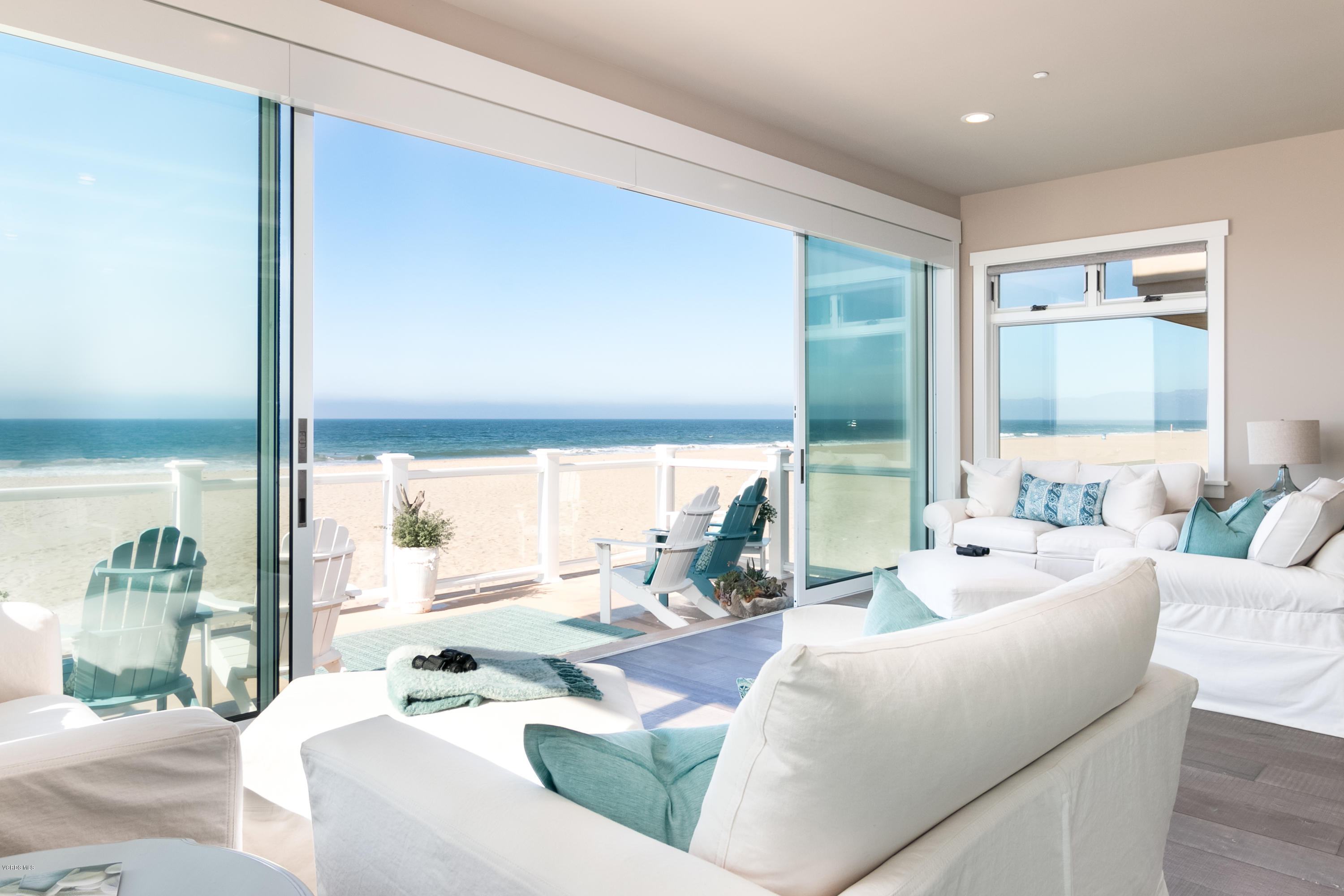 935 Mandalay Beach Road Oxnard, CA 93035 - Photo 18 of 67 a living room with furniture and a large window