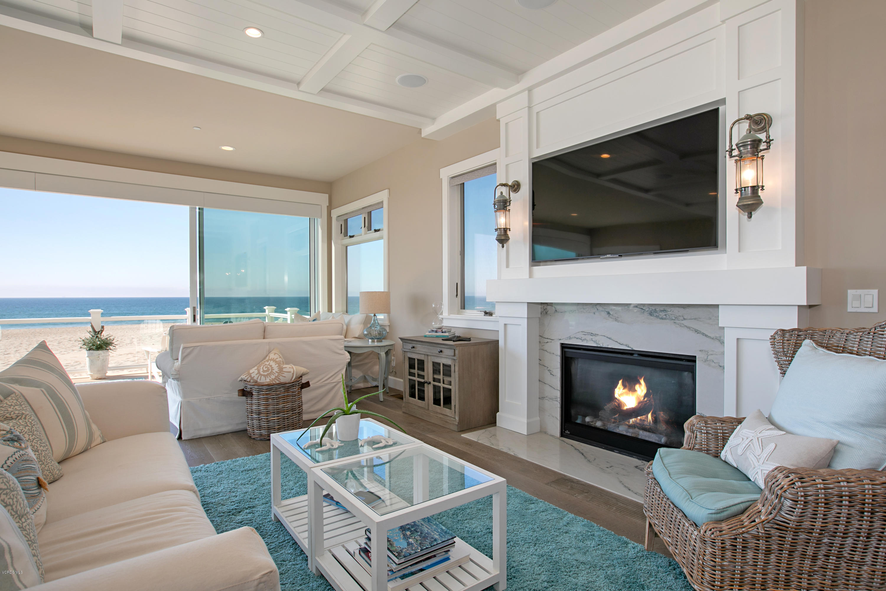 935 Mandalay Beach Road Oxnard, CA 93035 - Photo 23 of 67 a living room with furniture fireplace and flat screen tv