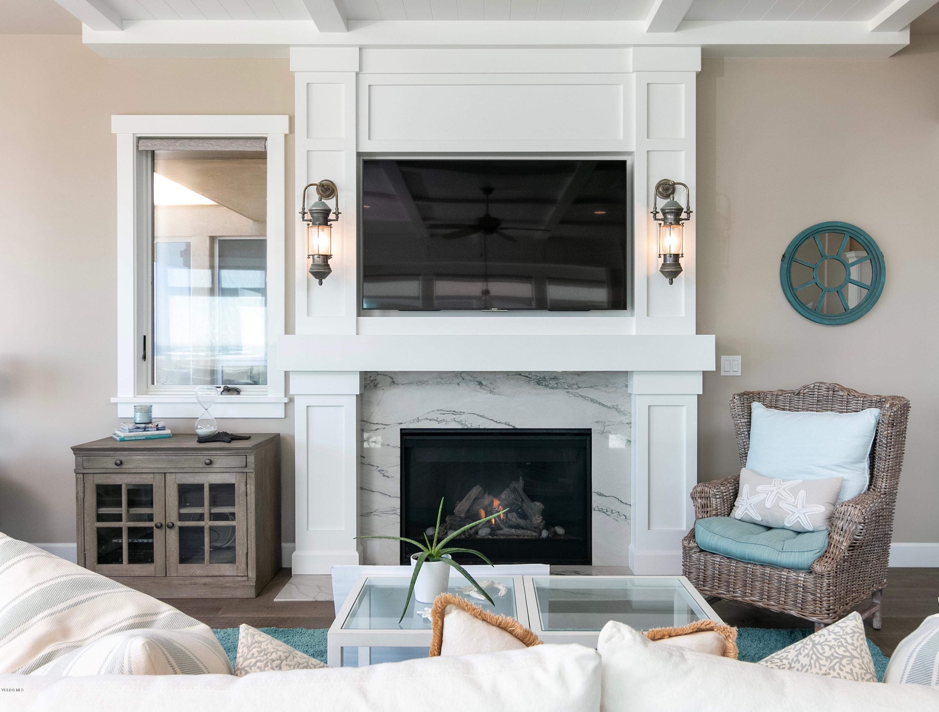 935 Mandalay Beach Road Oxnard, CA 93035 - Photo 24 of 67 a living room with furniture and a fireplace