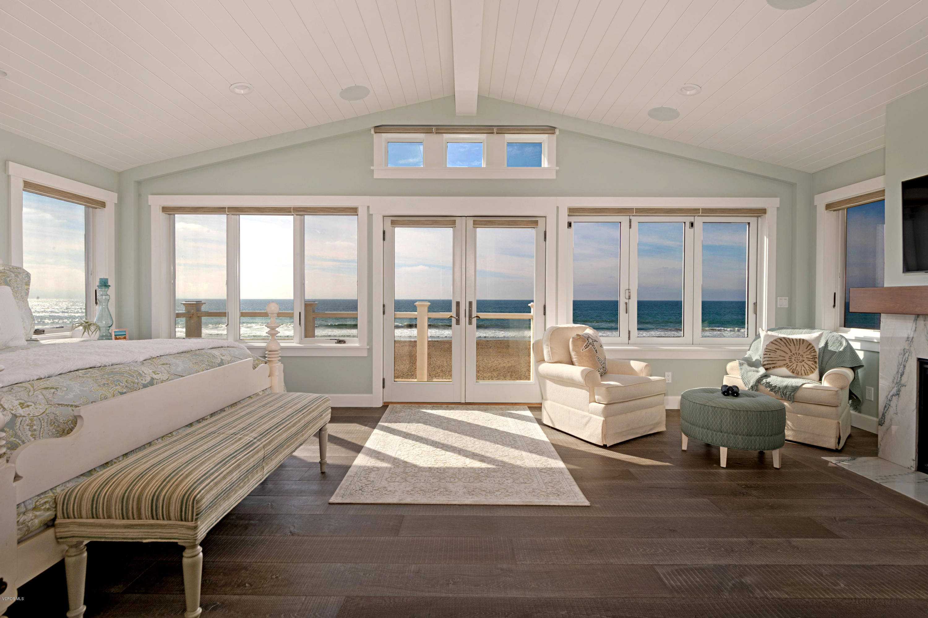 935 Mandalay Beach Road Oxnard, CA 93035 - Photo 25 of 67 a living room with furniture and floor to ceiling windows