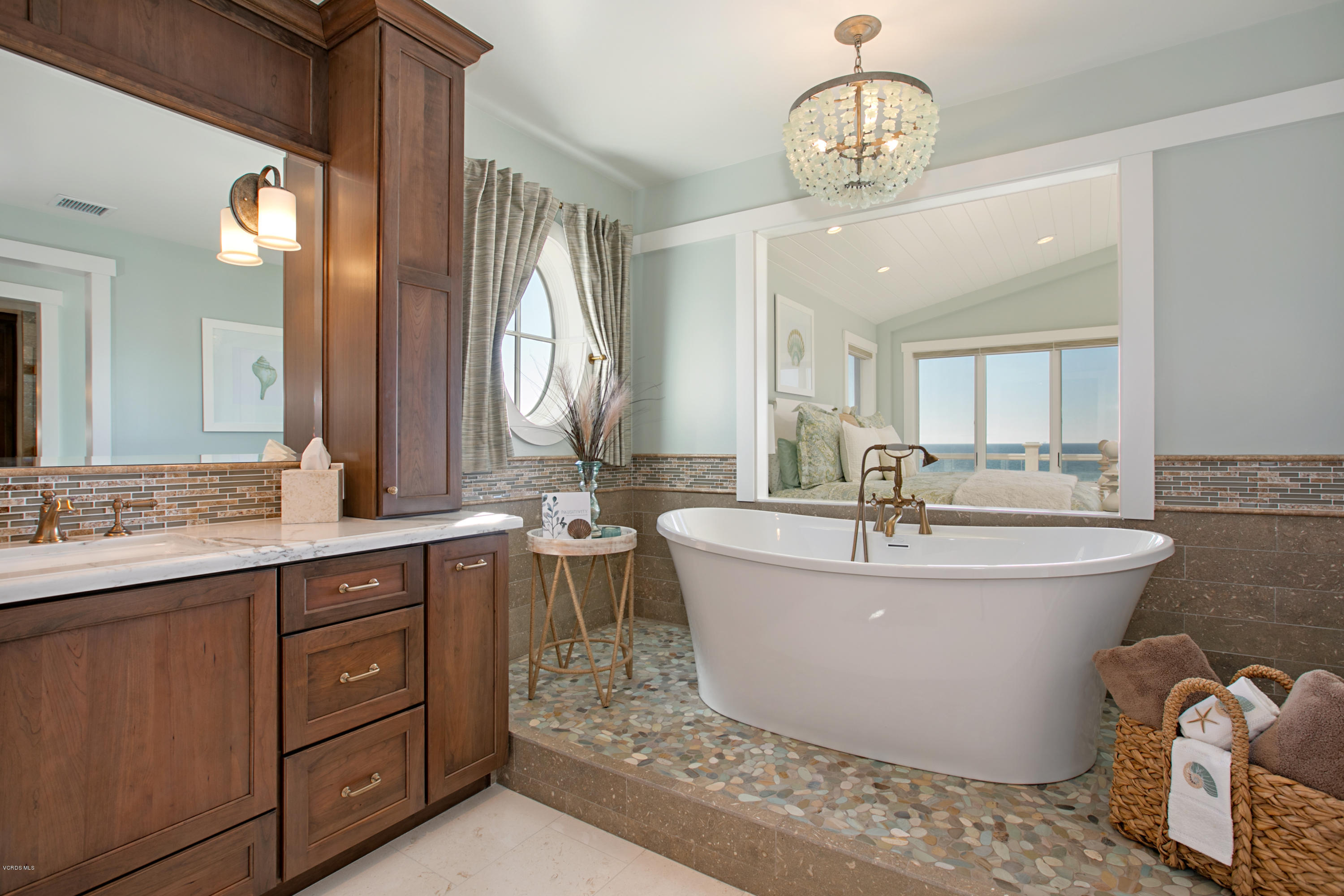 935 Mandalay Beach Road Oxnard, CA 93035 - Photo 29 of 67 a spacious bathroom with a tub sink and mirror