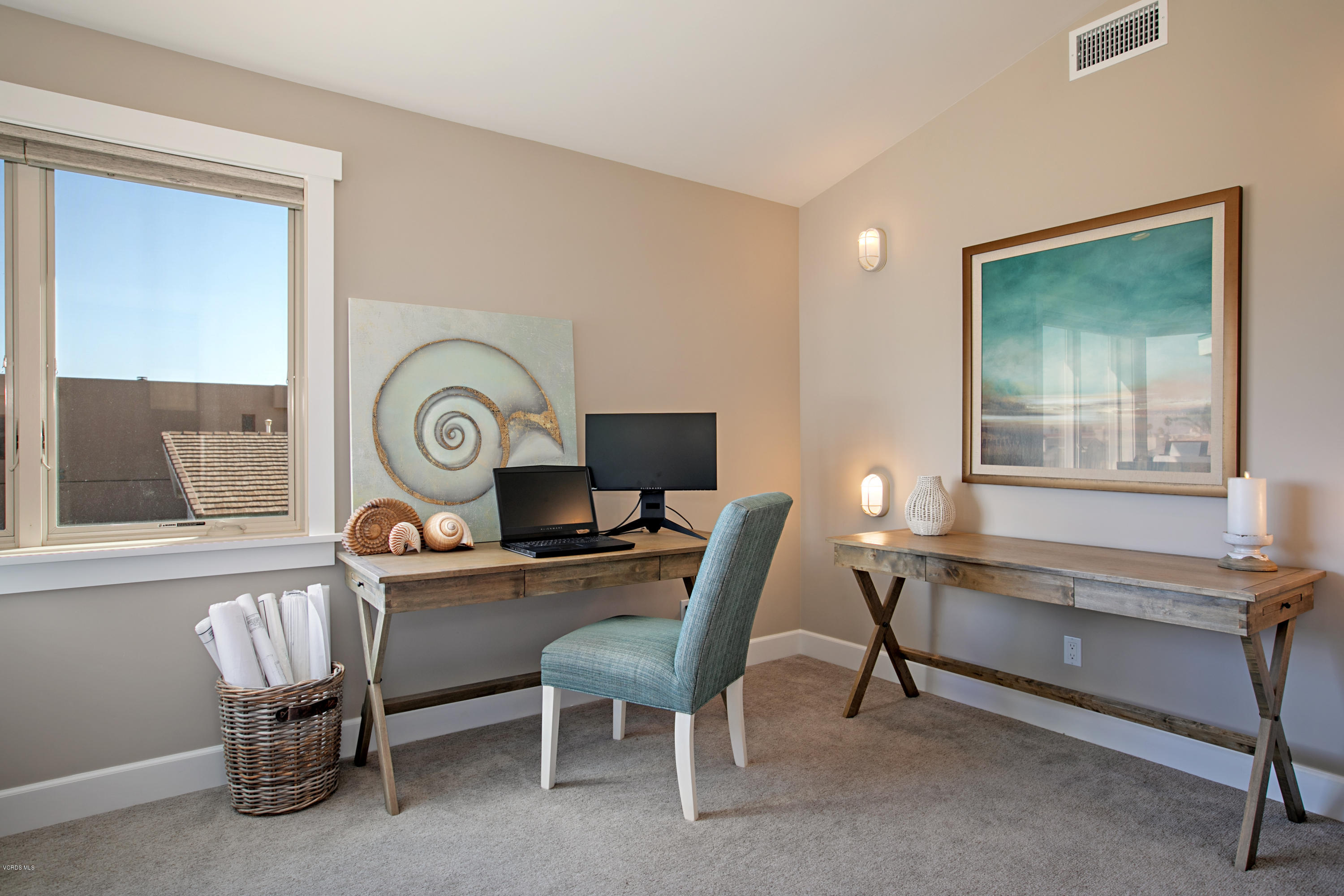 935 Mandalay Beach Road Oxnard, CA 93035 - Photo 37 of 67 a view of a workspace with furniture and a window