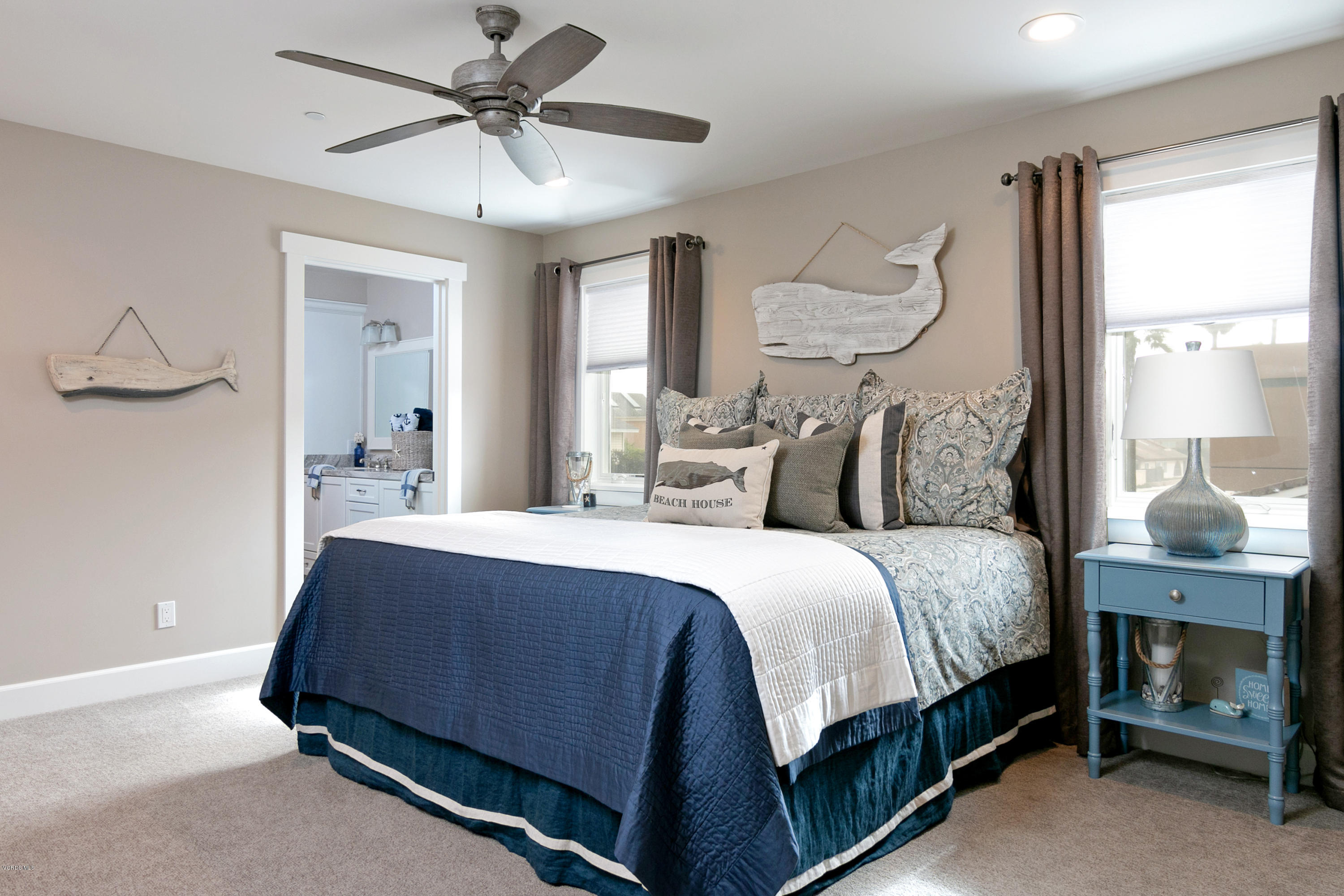 935 Mandalay Beach Road Oxnard, CA 93035 - Photo 45 of 67 a bedroom with a bed and window