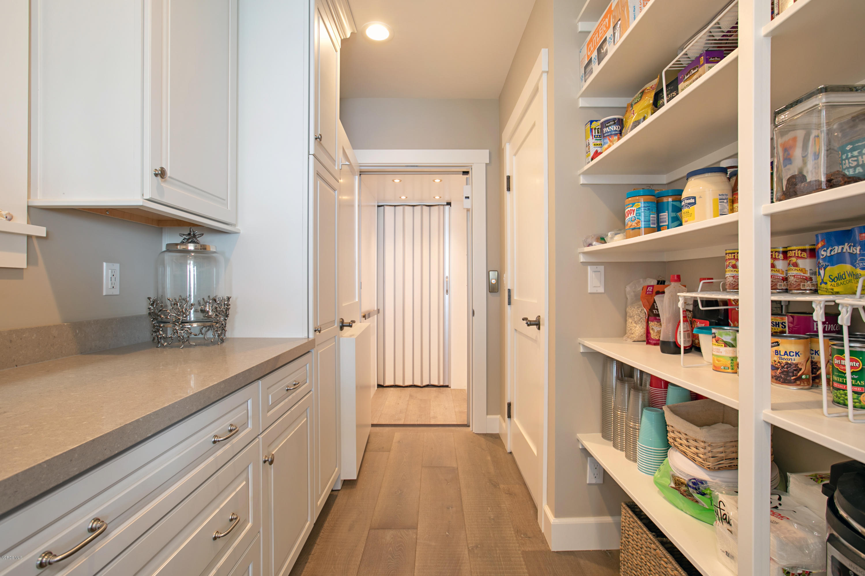 935 Mandalay Beach Road Oxnard, CA 93035 - Photo 56 of 67 a kitchen with stainless steel appliances granite countertop lots of counter top space and cabinets