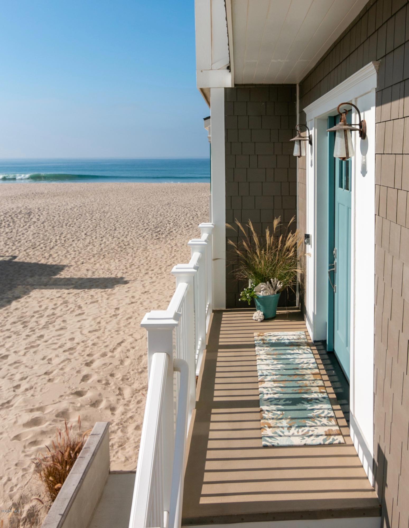 935 Mandalay Beach Road Oxnard, CA 93035 - Photo 8 of 67 a view of balcony with wooden floor and seating space