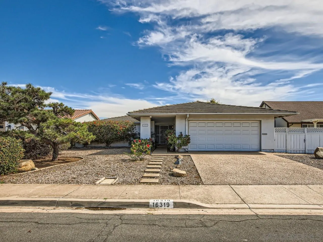 16319 Gabarda Road San Diego, CA 92128 - Photo 1 of 30 front view of a house with a pathway