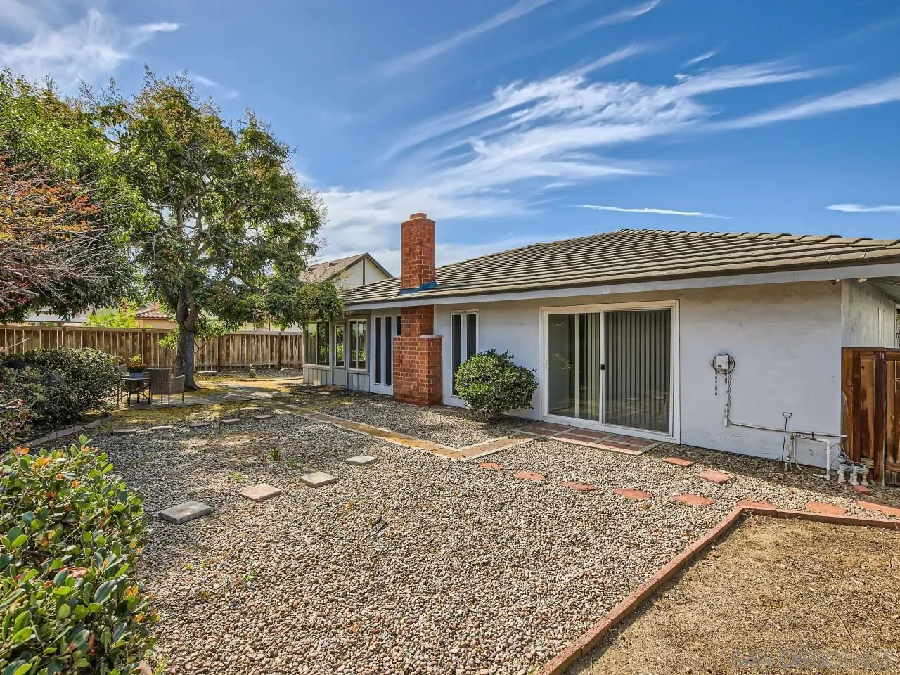 16319 Gabarda Road San Diego, CA 92128 - Photo 28 of 30 a front view of a house with a yard