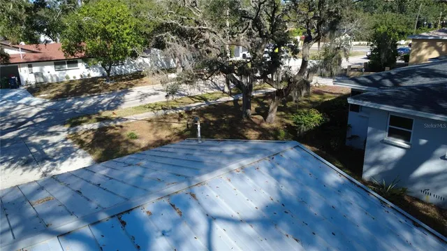 a backyard of a house with lots of green space