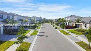 an aerial view of swimming pool and outdoor space