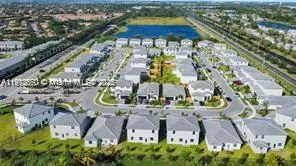 a view of swimming pool with patio