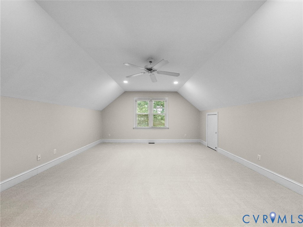2011 Gamelaw Court Midlothian, VA 23113 - Photo 57 of 77 an empty room with window and a ceiling fan