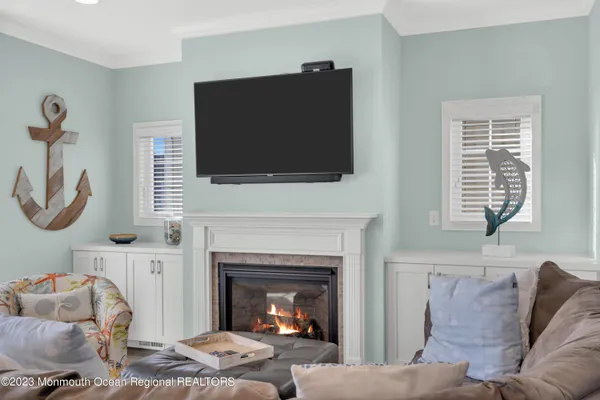 a bathroom with a granite countertop toilet sink and mirror