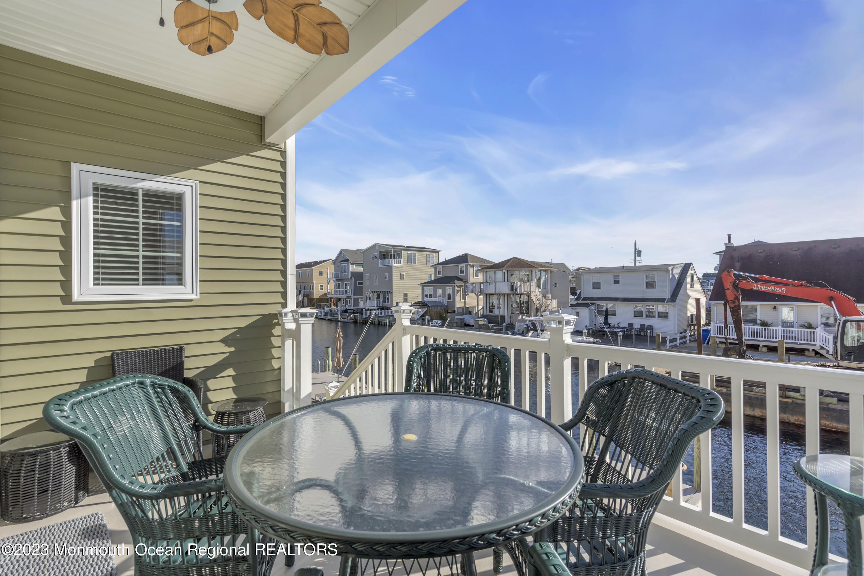 411 Harding Avenue Seaside Heights, NJ 08751 - Photo 34 of 71 a balcony with table and chairs