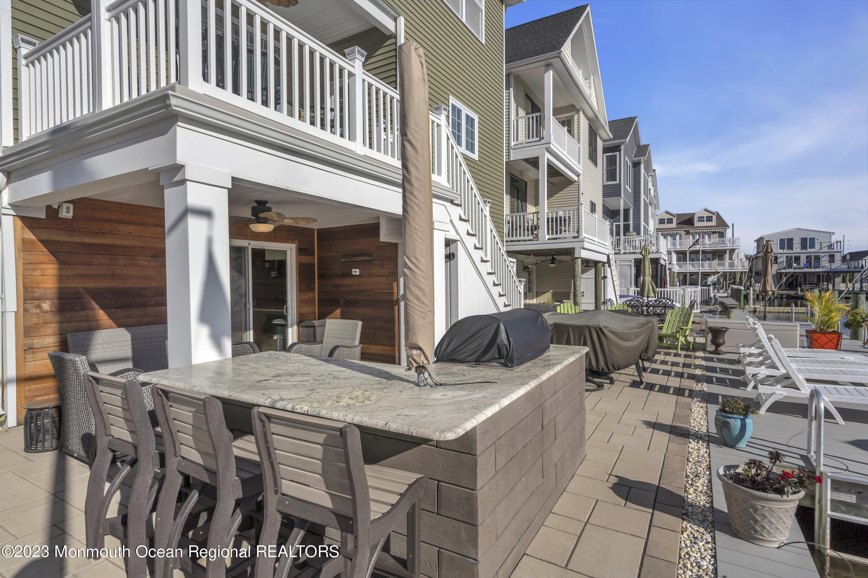 411 Harding Avenue Seaside Heights, NJ 08751 - Photo 64 of 71 a view of a dinning tables and chairs in the patio
