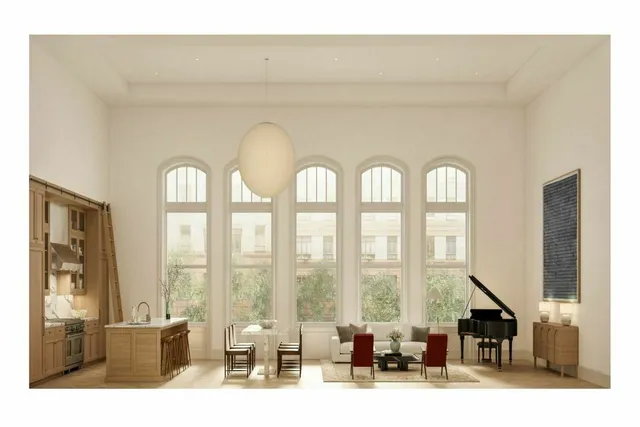 a living room with furniture and floor to ceiling windows